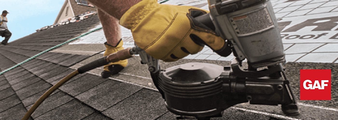 Picture of Roofer Putting Shingles on a Roof